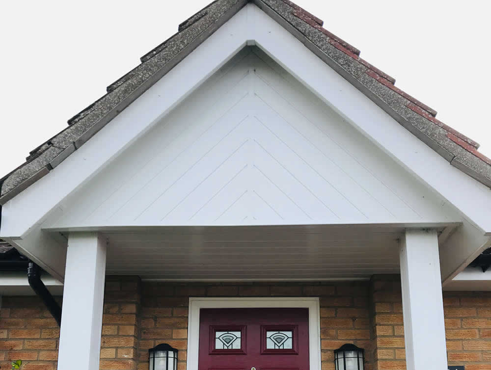 Water staining under faulty gutter, roofline issue example