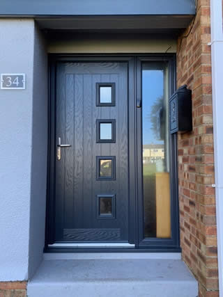 Anthracite Grey composite door with side panel.