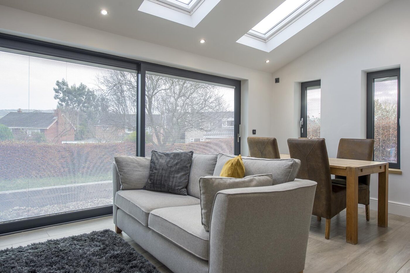 Integral blinds fitted to glazed doors in a home extension