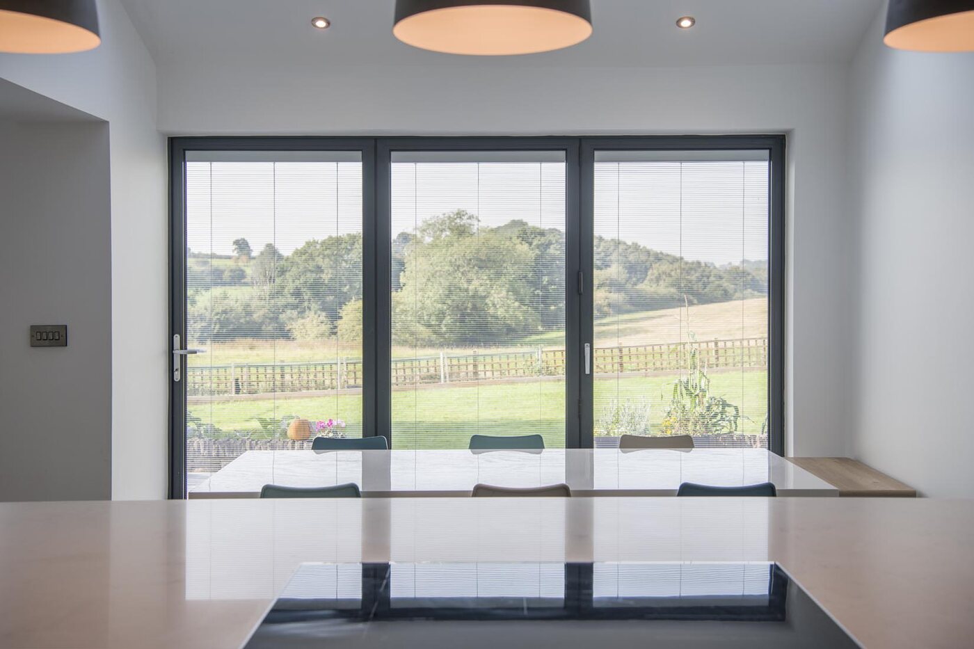 Venetian integral blinds fitted within sliding patio doors