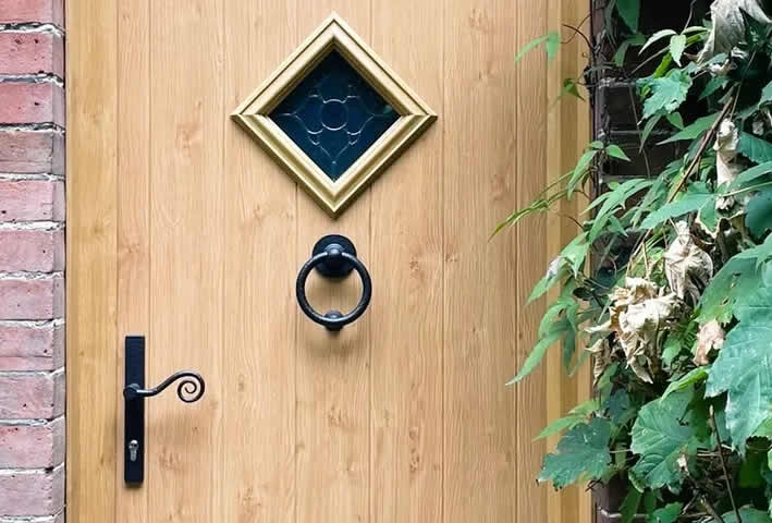 Irish Oak composite front door installed in Bressingham