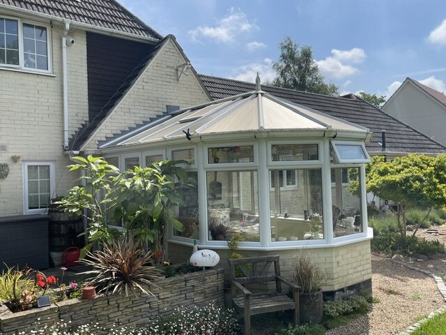 Original glazed conservatory roof before replacement with a lightweight solid roof in Eye
