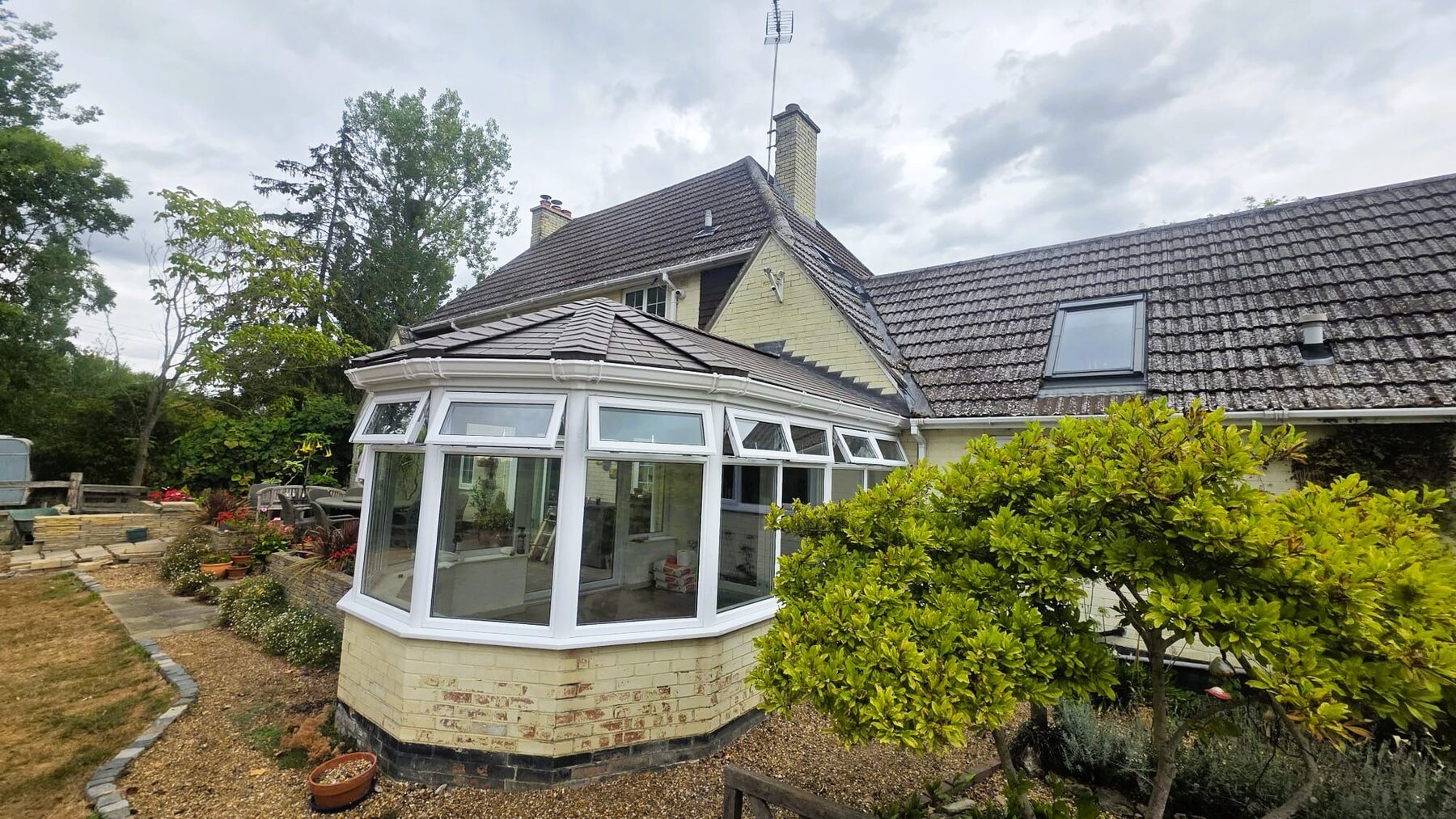 Side view of the new Equinox lightweight solid conservatory roof in Eye