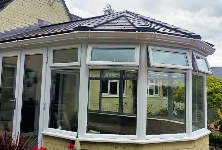 New Equinox lightweight solid conservatory roof installed in Eye