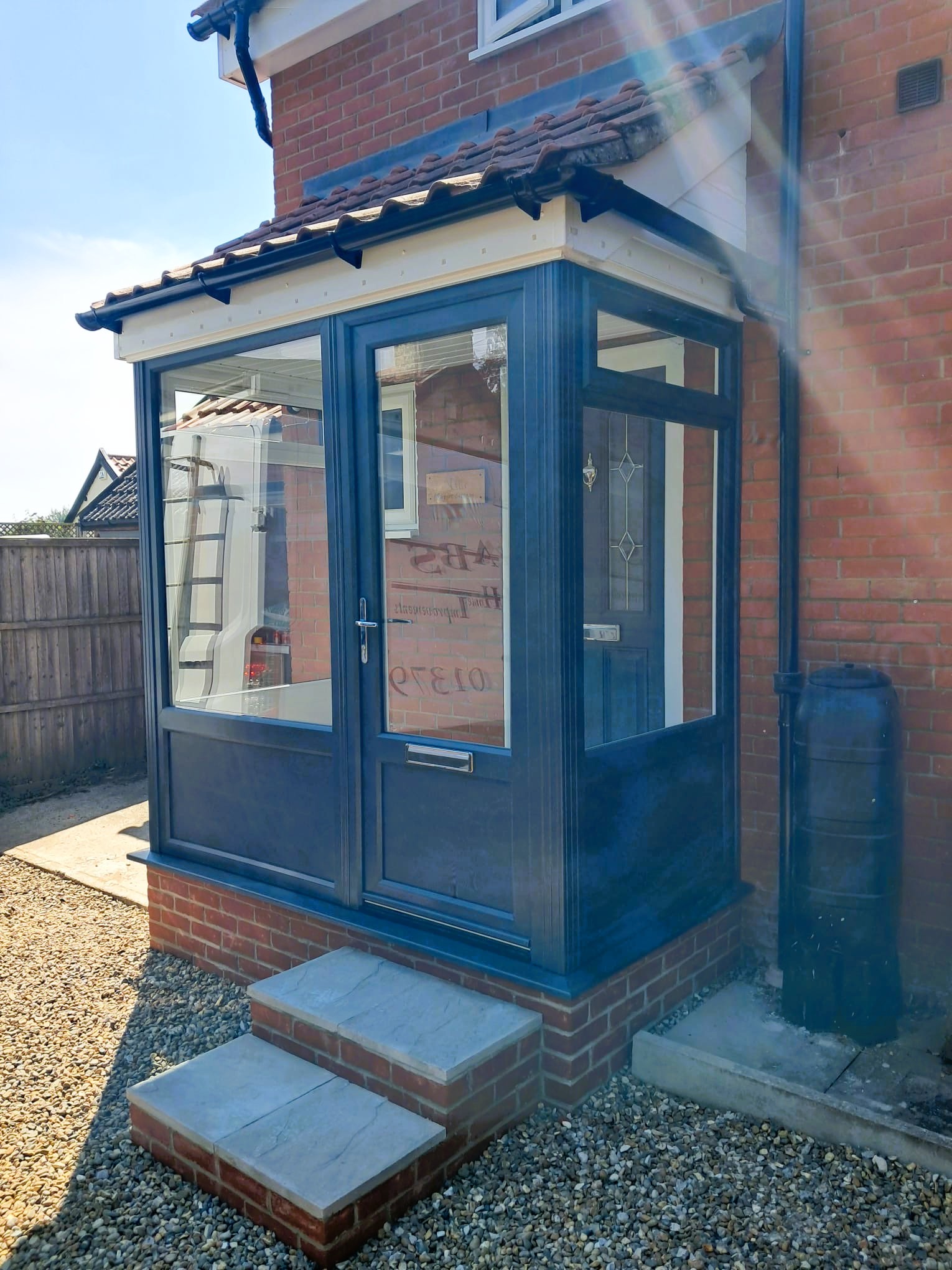 Side view of the new Anthracite Grey uPVC porch in Garboldisham