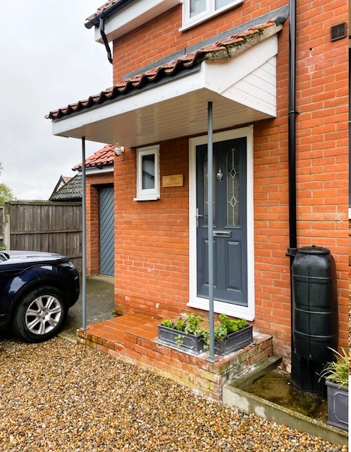Side view of the original open porch in Garboldisham