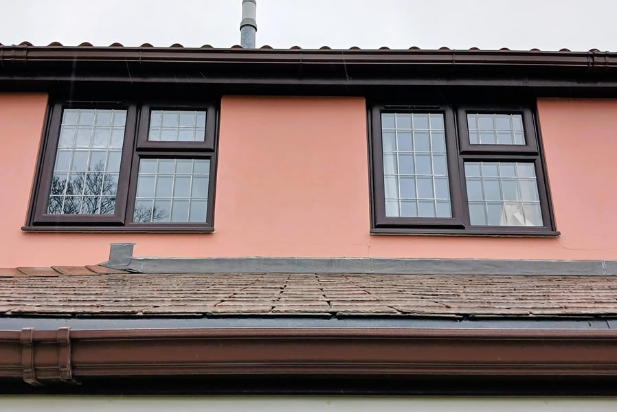 Composite entrance door with leaded side panel