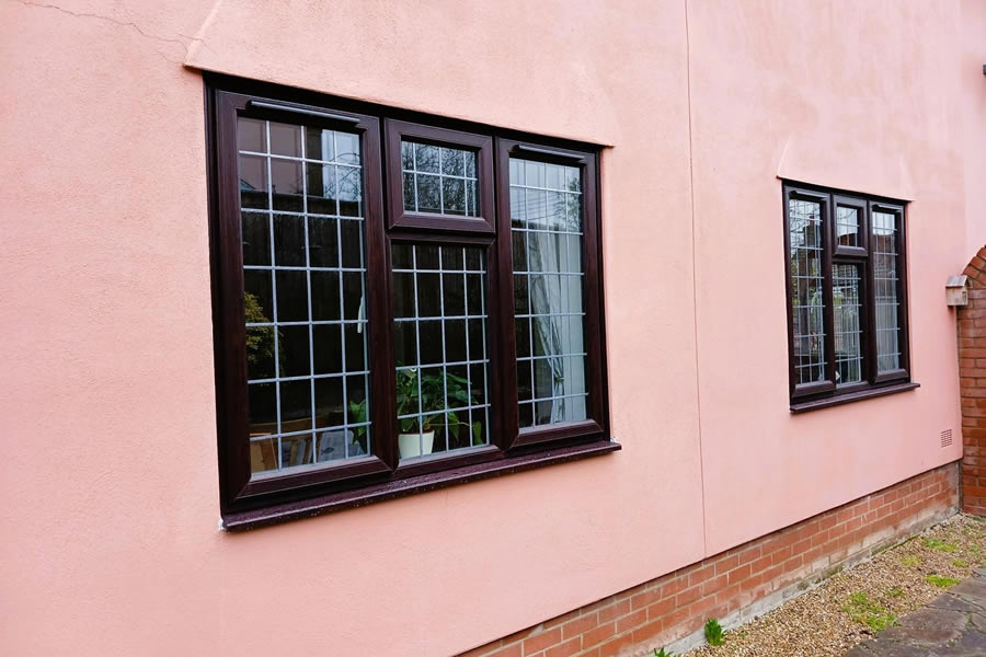 Rosewood uPVC door and matching window installation