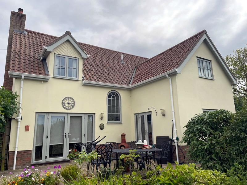 Painswick Grey uPVC bargeboards with white OGEE gutters in Hinderclay Suffolk