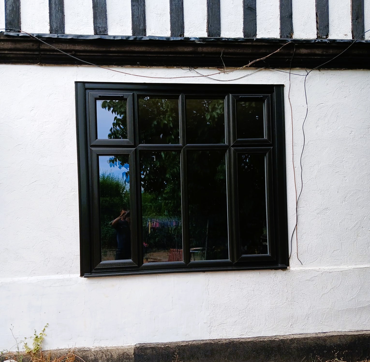 Original timber window at a property in Mendlesham before replacement