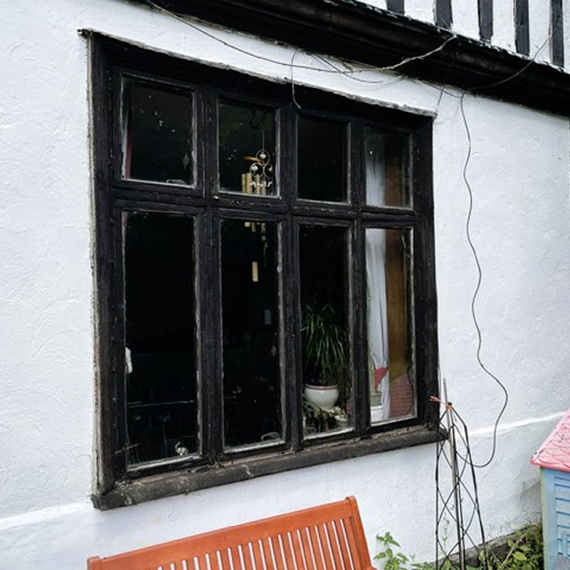 Original timber window at a property in Mendlesham before replacement