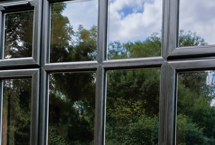 Black-on-white uPVC window installed in Mendlesham
